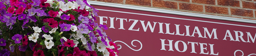 Fitzwilliam Arms Hotel: Picture Of Sign & Flowers